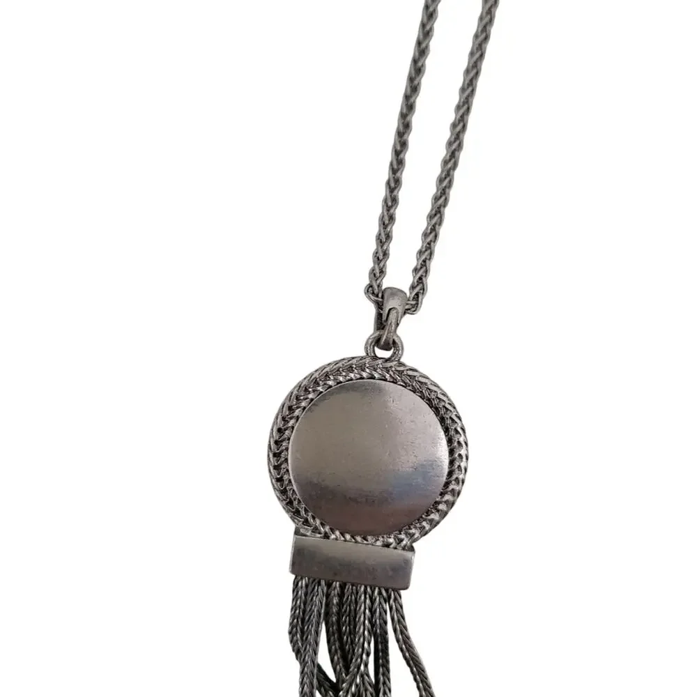 Long silver necklace with round pendant